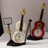 RELOJ DESPERTADOR GUITARRA XX21-020-3 TAMAÑO 22x13CM